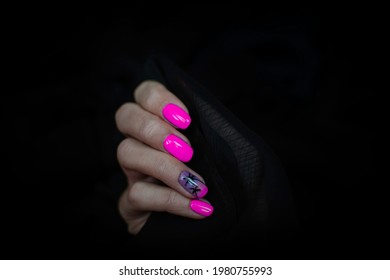 Summer Nail Decor Idea. Creative Manicure Design. Bright Pink Gel Polish On Short Fingernails. Selective Focus On The Hand, Blurred Background.