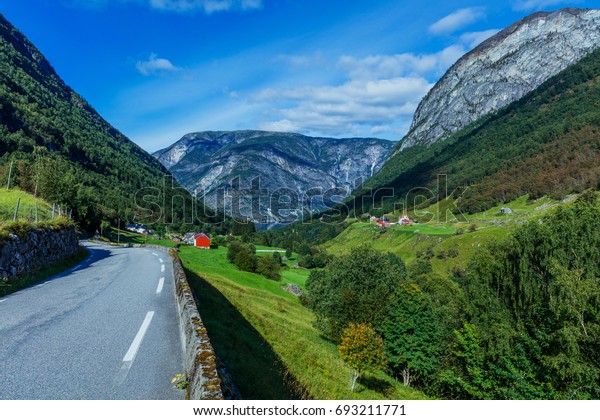 Summer Norway\
road landscape on high\
mountains.