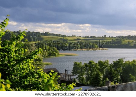 Summer on Kashubia: Beautiful pastoral landscape over the lake Klodno, Poland Stock fotó © 