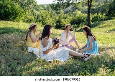 Summer Outdoor Party Ideas. Safe And Festive Ways To Host Small, Outdoor Gathering With Friends. People Safely Get Together. Young Women Girl Friends Talking, Laughing, Having Fun Together At Picnic