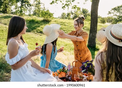 Summer Outdoor Party Ideas. Safe And Festive Ways To Host Small, Outdoor Gathering With Friends. People Safely Get Together. Young Women Girl Friends Talking, Laughing, Having Fun Together At Picnic