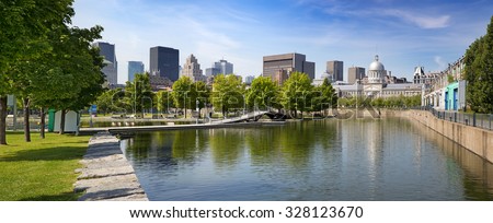 Summer panorama of downtown Montreal viewed from the park, showing the old Bonsecours Market building, which was the public city market for over 100 years. 