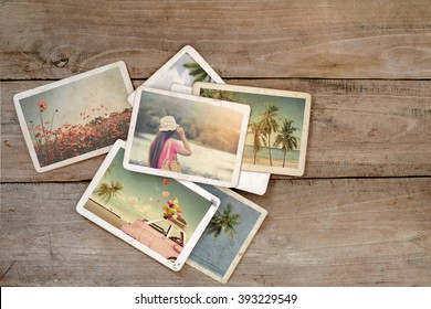 Summer Photo Album Of Remembrance And Nostalgia On Wood Table. Instant Photo Of Film Camera - Vintage And Retro Style