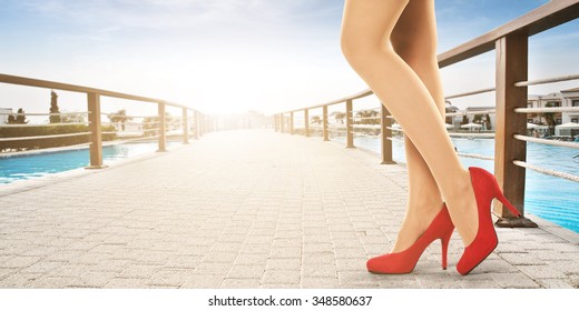 Summer Pier And Sun Light With Woman Long Legs And Shoes 