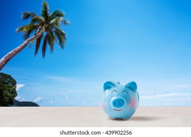 Summer Piggy Bank On The Beach,abstract Background To Saving For Holiday Vacation Concept.