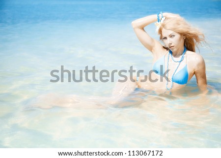 summer portrait of attractive woman in swimsuit