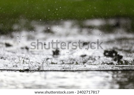 Summer Raining over an Empty Restaurant Table Outdoors Close Up Copy Space