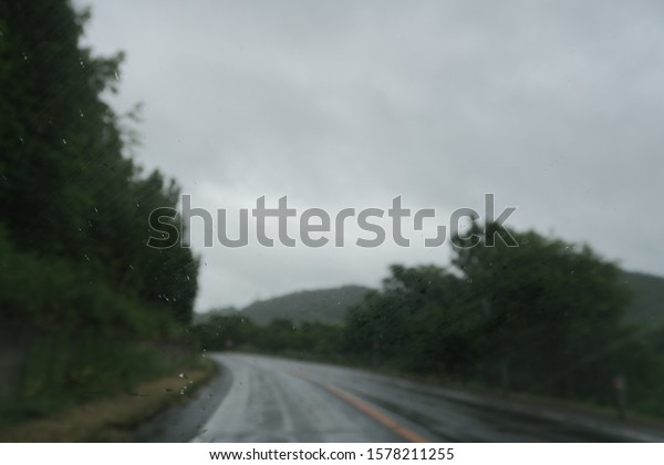 Summer rainy day scenery on the roadside in the
countryside of Hokkaido,
Japan