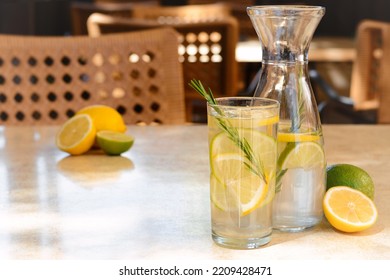 Summer Refreshing Lemonade On Light Table In Cafe, Space For Text