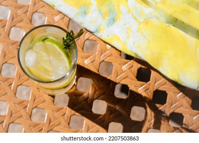 Summer Refreshing Lemonade On Wicker Bench, Above View. Space For Text