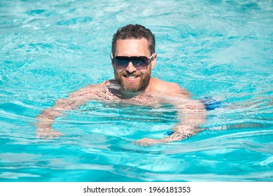 Summer Resort Vacation. Handsome Man In Swimming Pool. Pool Party. Summer Mood Concept.