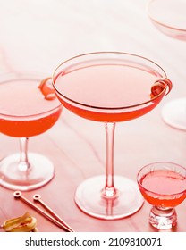 Summer Rhubarb Strawberry Spritz Cocktail On Rose Marble Background. Girls Party Drink Ideas. Brunch Cokctail Ideas. Vertical Shot. Selective Focus