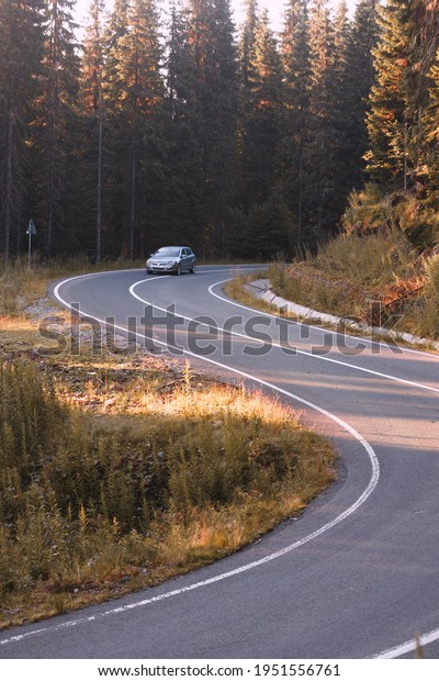 Summer Road Trip. beautiful landscape and view\
of a mountain road.\
Romania.\
