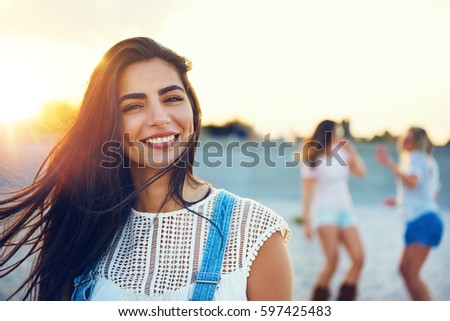 Image, Stock Photo pair of female beach slippers and a pink towel