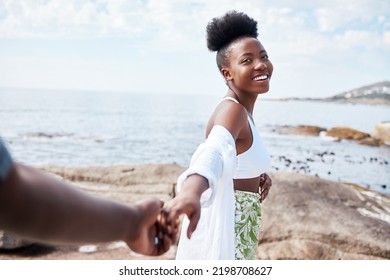 Summer, Sea And Smile, A Black Couple Holding Hands And Walking On The Beach. Nature, Love And Freedom On Romantic Weekend, A Black Woman And Man By The Ocean. Holiday, Adventure And Romance With POV