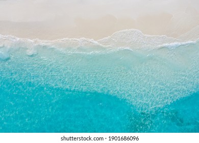 Summer Seascape Beautiful Waves, Blue Sea Water In Sunny Day. Top View From Drone. Sea Aerial View, Amazing Tropical Nature Background. Beautiful Bright Sea With Waves Splashing And Beach Sand Concept