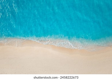 Summer seascape beautiful waves, blue sea water in sunny day. Top view from drone. Sea aerial surf, amazing tropical nature background. Mediterranean bright sea bay, waves splashing beach sandy coast - Powered by Shutterstock