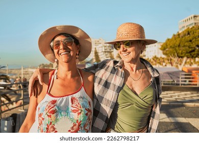 Summer, senior friends and women at beach day on weekend, retirement holiday and vacation. Travel, friendship and smile, happy and excited elderly females on adventure, freedom and relax in Miami - Powered by Shutterstock