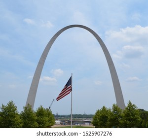 Summer In St. Louis Missouri: American Flag And Gateway Arch With Construction