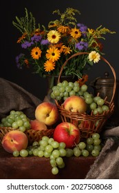 Summer still life with wild flowers, grapes and peaches in the style of old Dutch masters