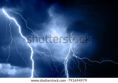 Summer storm bringing thunder, lightnings and rain.