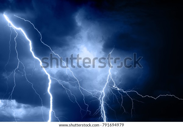 Summer storm\
bringing thunder, lightnings and\
rain.