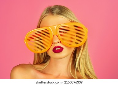 Summer Style. Attractive Girl In Big Funny Striped Sunglasses. Holidays And Vacation Concept.