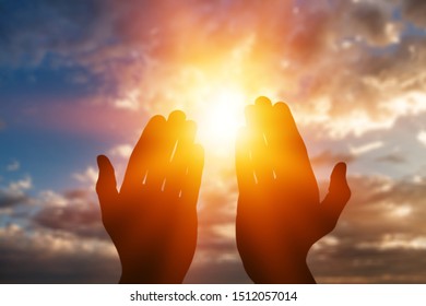 Summer sun solstice with human hands silhouette