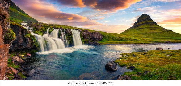 Summer sunset on famous Kirkjufellsfoss Waterfall and Kirkjufell mountain. Colorful evening panorama of Snaefellsnes peninsula, Iceland, Europe. Artistic style post processed photo. - Powered by Shutterstock