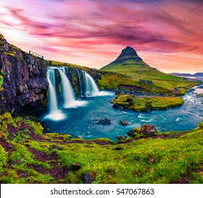 Summer sunset on famous Kirkjufellsfoss Waterfall and Kirkjufell mountain. Colorful evening scene on Snaefellsnes peninsula, Iceland, Europe. Artistic style post processed photo. - Powered by Shutterstock