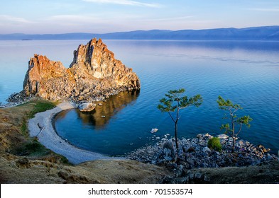 Summer Sunset Over Rock Of Shamanka Burhan On Olkhon Island In Lake Baikal, Russia