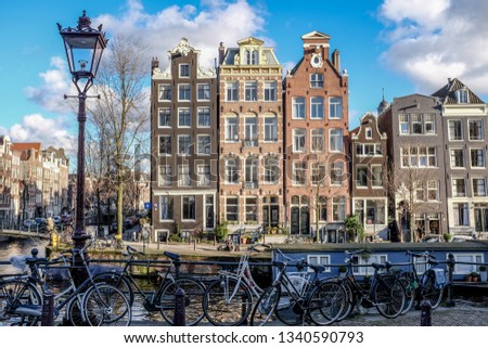 Similar – Schöne Architektur niederländischer Häuser und Hausboote am Amsterdamer Kanal im Herbst