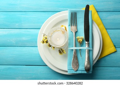 Summer Table Setting  On Color Wooden Background