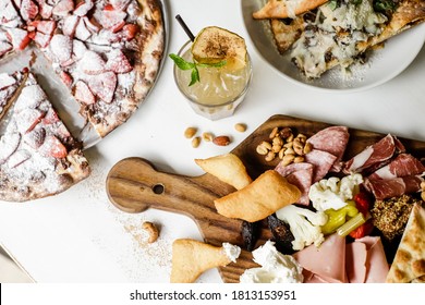 Summer Table Spread With Pizza And Cocktails