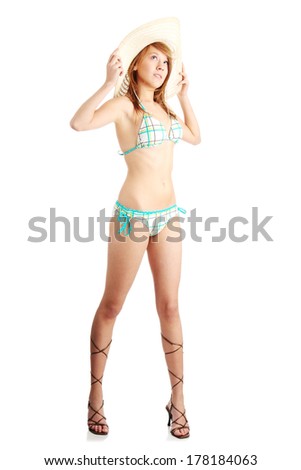 Summer teen girl in swimsuit, isolated on white background 