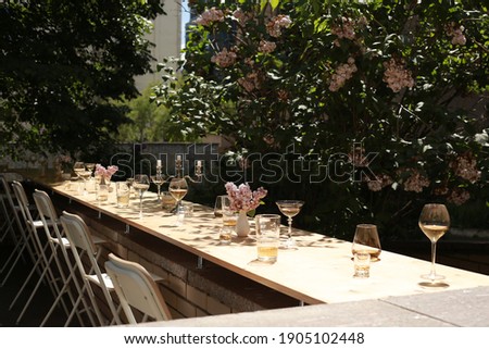 
Summer terrace with glasses and cocktails