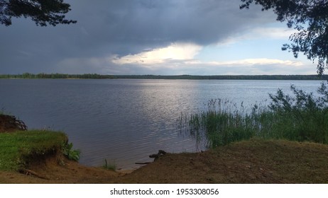 A Summer Thunderstorm Is Coming To The Lake, Large Storm Clouds Are Gathering