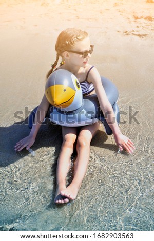 Similar – Surfer woman and yellow surfboard-France