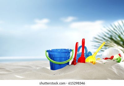 Summer Time On Beach And Toys In Sand 