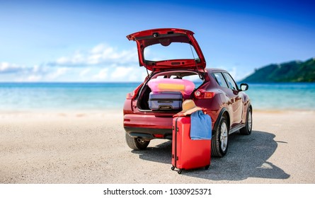 Summer Time And Red Car On Beach With Few Suitcase. Free Space For Your Text Or Product. 