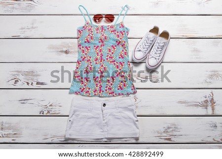 Similar – Image, Stock Photo Women’s summer shoes and hat for beach holidays