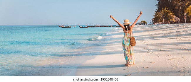 Summer Travel Vacation Concept, Happy Traveler Asian Woman With Dress Relax And Sightseeing On Beach In Evening At Koh Lipe, Satun, Thailand,