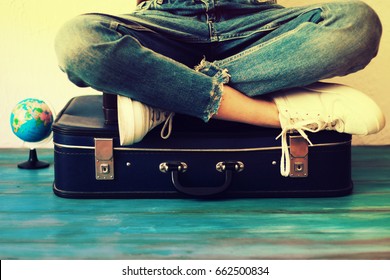 Summer Travel And Vacation Concept,Young Woman Packing Suitcase At Home