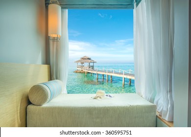 Summer, Travel, Vacation and Holiday concept - Beautiful tropical sea view at window in resort, Phuket ,Thailand.
