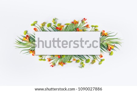 Similar – Frame with tropical palm leaves and flowers