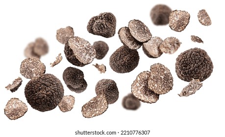 Summer truffles and truffle slices levitating or flying in the air on white background. - Shutterstock ID 2210776307