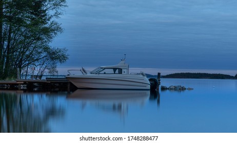 Summer Twilight With Motorboat On Lake Päijänne In Finland