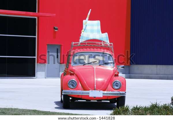 summer vacation car\
with chair on the top
