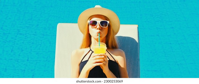 Summer vacation, happy relaxing young woman lying on deckchair drinking fresh juice on pool background - Powered by Shutterstock