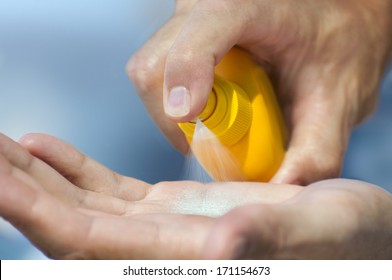 Summer Vacation - Man At A Tropical Beach With Sunblock Cream 